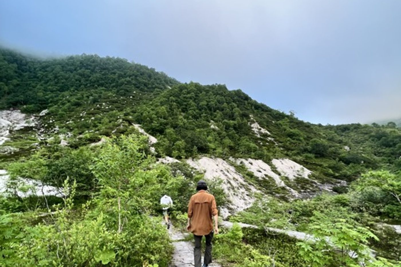 Walking the white volcanic ground of Iwao-nupuri